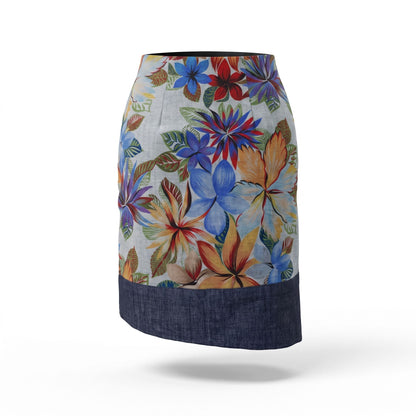 Vista posteriore della gonna midi asimmetrica artigianale in cotone con stampa floreale multicolore e dettagli in denim blu.